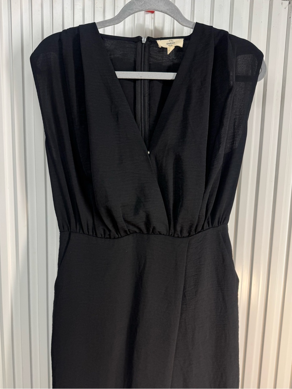 Entro jumpsuit size Small Elegant Black V-Neck